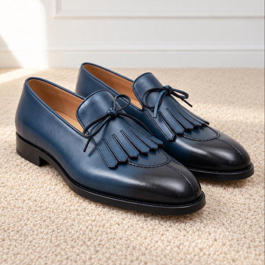 The Pembroke Burnished Midnight Navy leather kiltie bow loafers by Halford